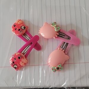 Pink Hello Kitty Hair Pins (2 pairs). Brand= Hello kitty.